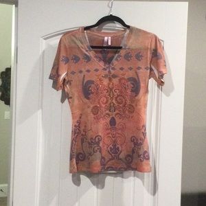 Kiara brand embellished T-shirts.